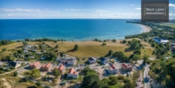 Lage Hintergrund Suedstrand - Moderne Luxus-Maisonette Wohnung mit Terrasse und Ostsee-Blick