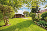 Blick in den Garten - Idyllisch gelegenes Einfamilienhaus auf großem Grundstück in Hoppenrade!