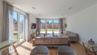 Wohnzimmer Blick Garten - *RESERVIERT* Helles und modernes Einfamilienhaus - ca. 30km bis Berlin Charlottenburg