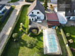Urlaubsfeeling zuhause: Einfamilienhaus mit Pool in Neustadt - Dosse für unbeschwertes Wohnen - Vogelperspektive